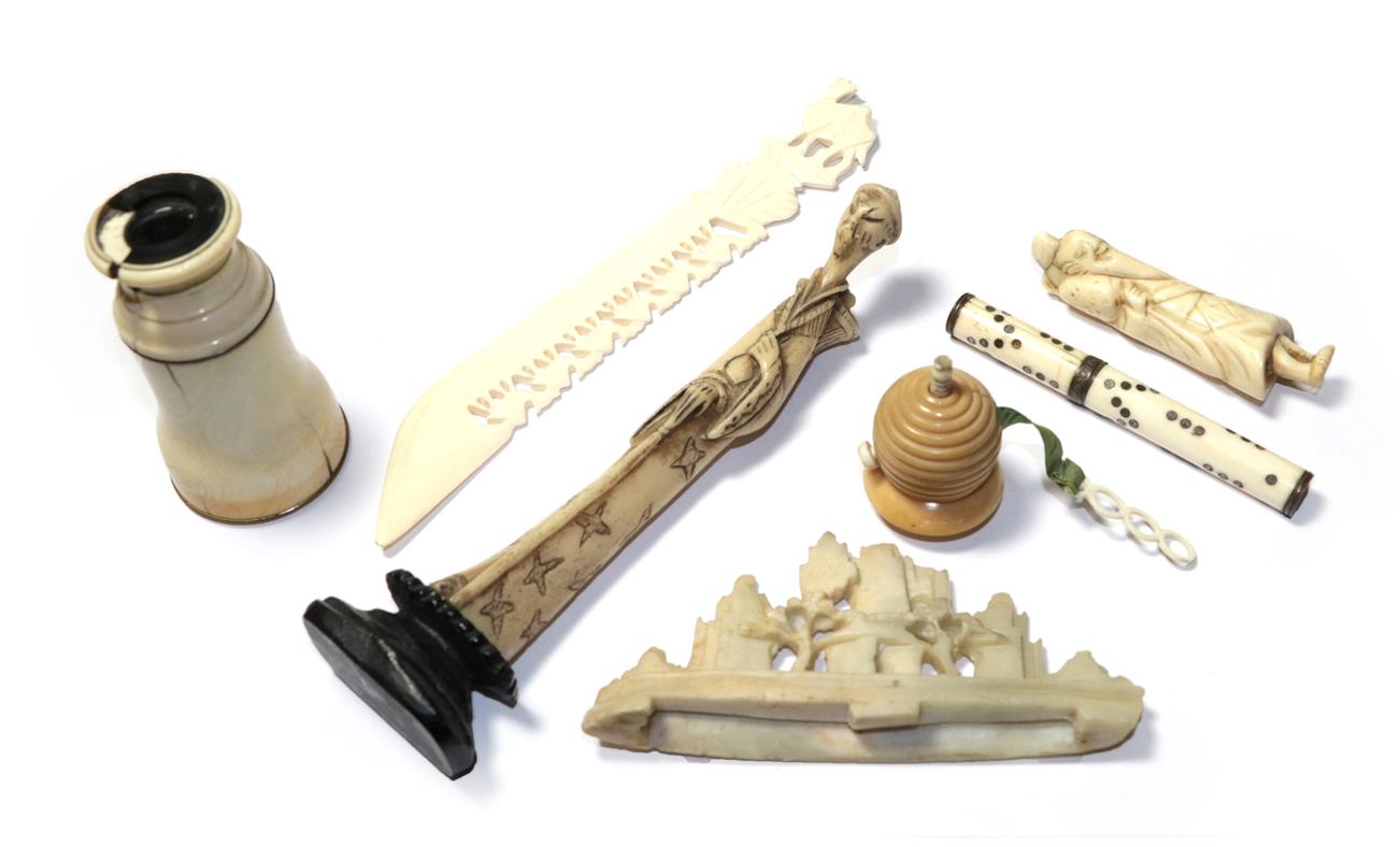 Lot 92 - A quantity of 19th century ivory and bone items including a beehive form tape measure,...