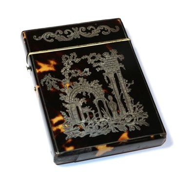 Lot 115 - A Victorian tortoiseshell and silver inlaid card case, decorated with a folly, foliate scrolls...