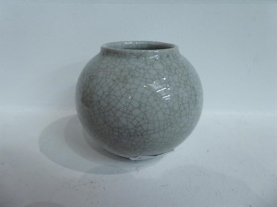 Lot 140 - A Chinese Guan-type water pot, in Song style, of ovoid shape with everted rim and crackle...