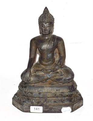 Lot 141 - A Sino-Tibetan cast metal sculpture of a Buddha raised on a lotus plinth, 30cm