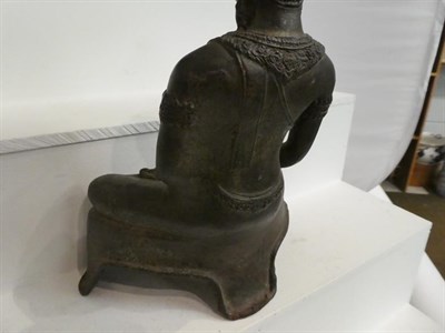 Lot 142 - A 19th century cast metal statue of a seated Buddha, possibly Thai, 31cm