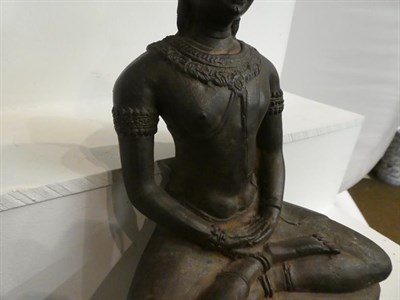 Lot 142 - A 19th century cast metal statue of a seated Buddha, possibly Thai, 31cm