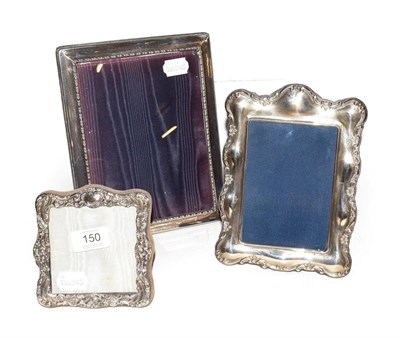 Lot 150 - An Edwardian silver faced photograph frame and two reproduction ditto (3)