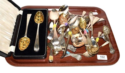 Lot 152 - A tray of assorted silver spoons and servers, to include a pair of berry spoons by Peter & Ann...