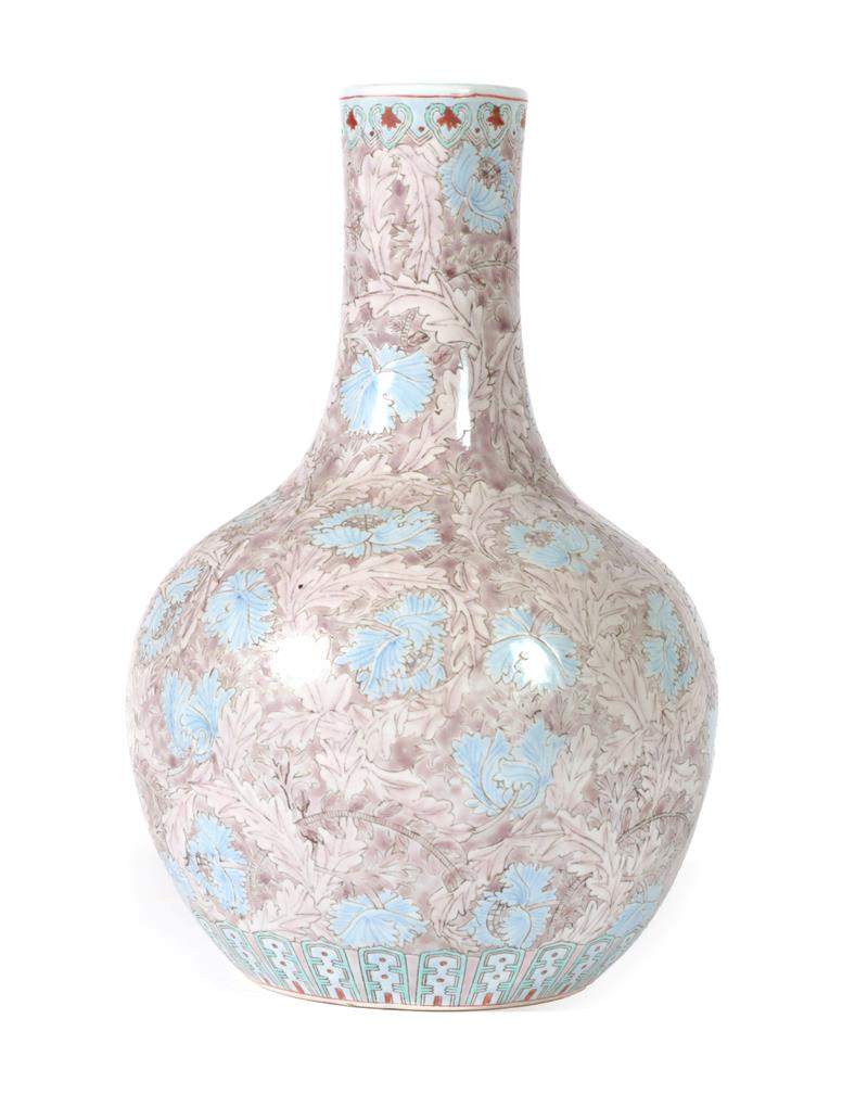 Lot 185 - A Chinese porcelain bottle vase, Tianquiping, early 20th century, painted in shades of pink and...