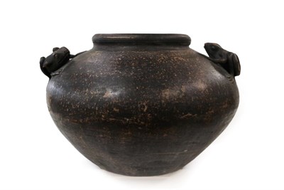 Lot 186 - A Chinese Cizhou style guan, possibly Ming, of ovoid form, modelled with twin toad handles,...