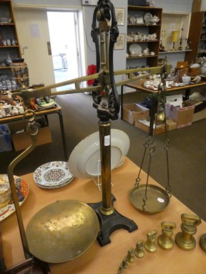 Lot 213 - A set of Victorian brass and iron W & T Avery shop weighing scales, together with a set of...