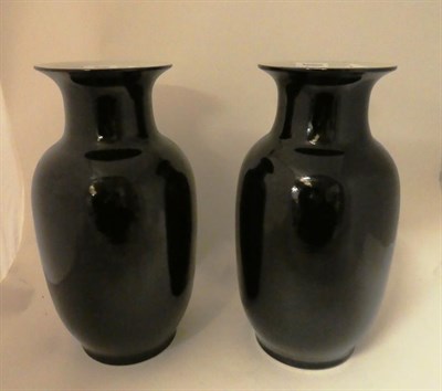 Lot 218 - A pair of Chinese porcelain mirror black glazed vases, late Qing/republic period, of lantern shape