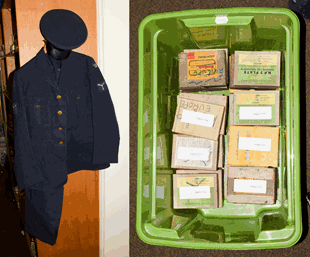 Lot 224 - A Royal Air Force uniform with cap and RAF cap badge, together with a box of glass plate...