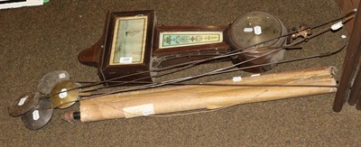 Lot 230 - An American wall clock signed Newhaven, five long case clock pendulums together with Bacons map...
