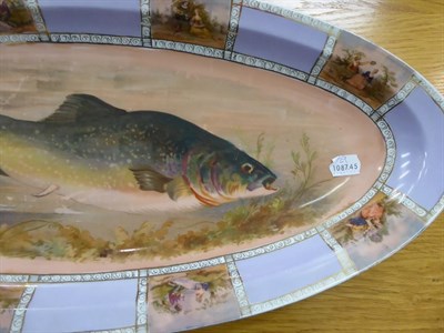 Lot 246 - Continental porcelain lilac-ground fish service of twenty-four pieces and similar coffee wares,...