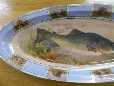 Lot 246 - Continental porcelain lilac-ground fish service of twenty-four pieces and similar coffee wares,...