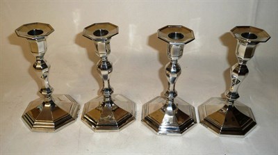 Lot 289 - A Set of Four Victorian and Later Matched Candlesticks, all Hawkesworth, Eyre & Co Ltd,...