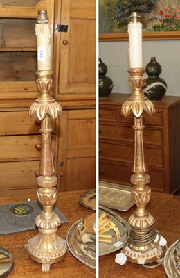 Lot 263 - Pair of tall carved giltwood candlestick table lamps 61cm to the top of the gilt (2)