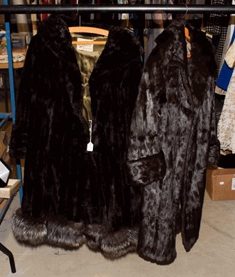 Lot 1125 - J Bryer Harrogate brown ermine fur coat with turn back cuffs together with a Scotch Mole coat...