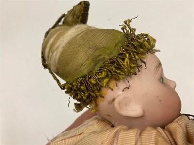 Lot 1135 - Squat bisque head Automata doll, with fixed blue eyes, closed mouth, marks indistinct '412'?,...