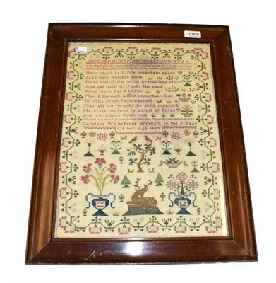 Lot 1169 - An alphabet sampler worked by Caroline Wilberforce Aged 9, Dated 1834, alphabet and verse worked in