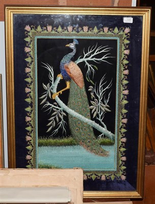 Lot 1206 - Modern decorative embroidered picture of a peacock on a velvet ground, worked in silk and gilt...