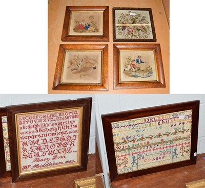 Lot 1211 - Two Victorian framed woolwork samplers, along with four other framed woolwork pictures (6)