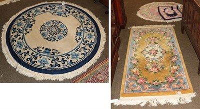 Lot 1263 - Circular Chinese Rug, the ivory field with lotus flower medallion framed by similar borders,...