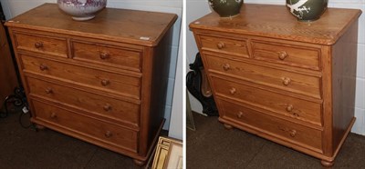 Lot 1271 - A pair of pine five drawer chests, of two short over three long graduated drawers, 91cm by 41cm...