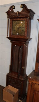 Lot 1276 - A carved oak thirty hour longcase clock, the square brass dial signed Ewbank, Elland