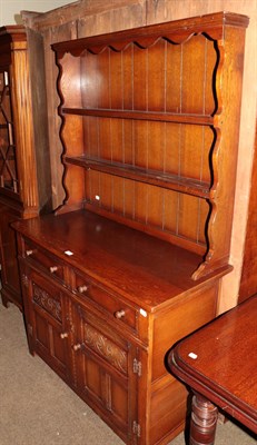 Lot 1285 - A 20th century oak dresser and rack, bearing label J H Hesketh & Son. Ltd. Burnley, 107cm by...
