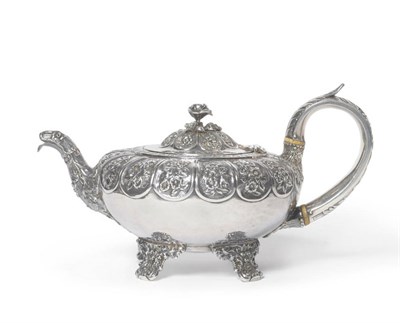 Lot 310 - A George IV Teapot, Hyam Hyams, London 1824, of compressed circular form with foliate chased...