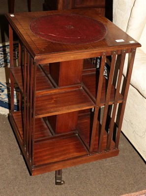 Lot 1300 - An mahogany and leather revolving bookcase