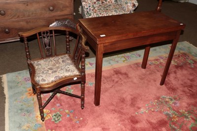 Lot 1302 - A George III mahogany fold over tea table, raised on square supports, 88.5cm by 43cm by 73cm...