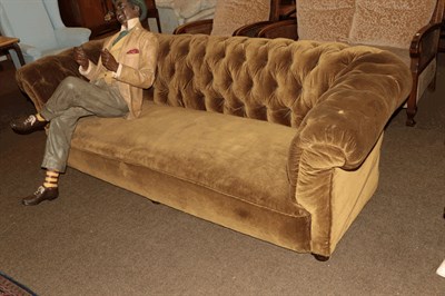 Lot 1312 - An early 20th century Chesterfield upholstered in olive velvet, 226cm by 72cm