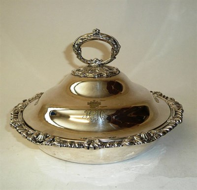 Lot 312 - A George IV Irish Vegetable Dish, James Scott, Dublin 1825, retailer's mark LAW, circular with cast