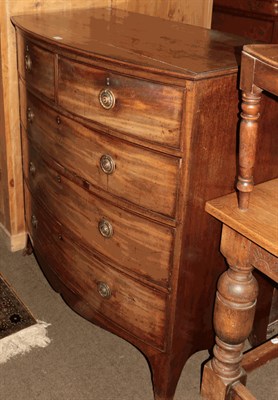 Lot 1328 - A George III mahogany bow fronted chest, 110cm by 61cm by 114cm