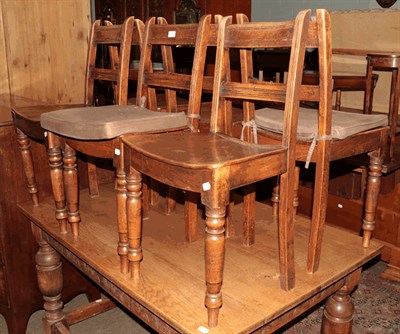 Lot 1329 - A set of six early 19th century ash dining chairs raised on turned supports, one chair with...