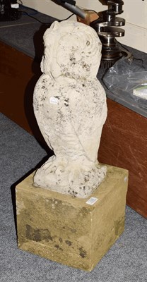 Lot 1370 - Garden statue of an owl on a grit stone base, 70cm high