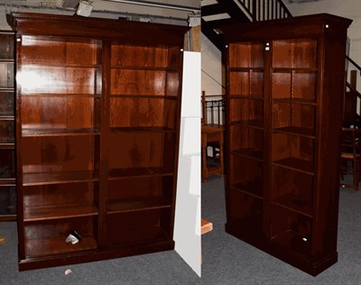 Lot 1384 - Two reproduction mahogany open bookcases with adjustable shelves, the largest 147cm by 30cm by...