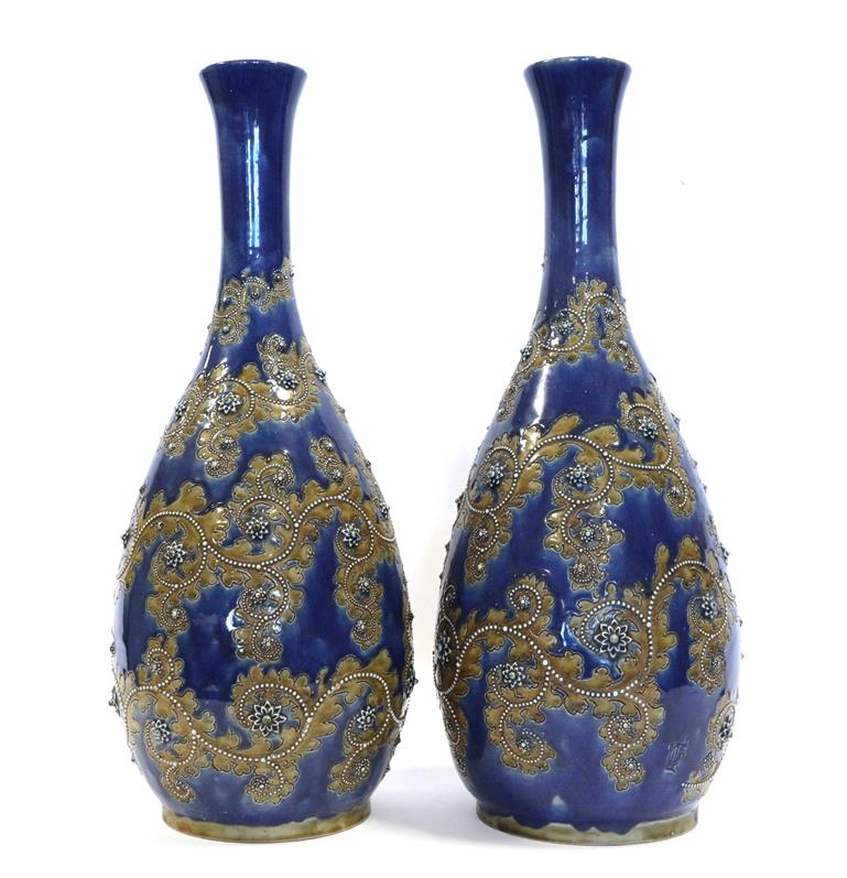 Lot 2002 - George Tinworth (1843-1913) for Doulton Lambeth: A Large Pair of Stoneware Vases, with applied...