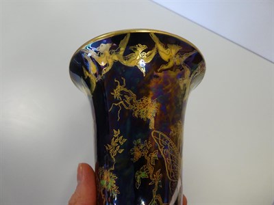 Lot 2014 - A Wedgwood Black Fairyland Lustre Butterfly Woman and Floating Fairies Design Trumpet Vase,...