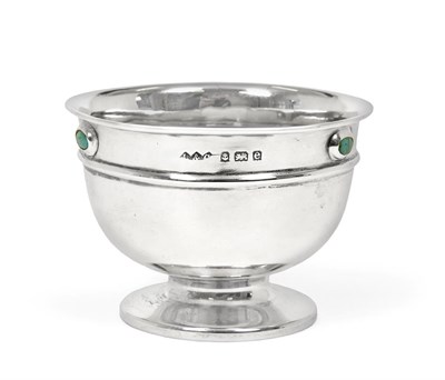 Lot 2066 - An Arts & Crafts Liberty & Co, Silver Pedestal Bowl, set with three cabochon turquoise matrix...