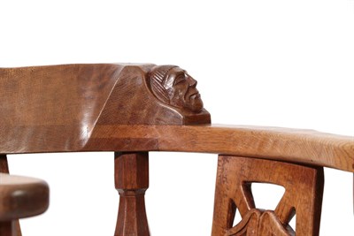 Lot 2087 - Robert Mouseman Thompson (1876-1955): An English Oak Monk's Chair, with curved back and shaped...