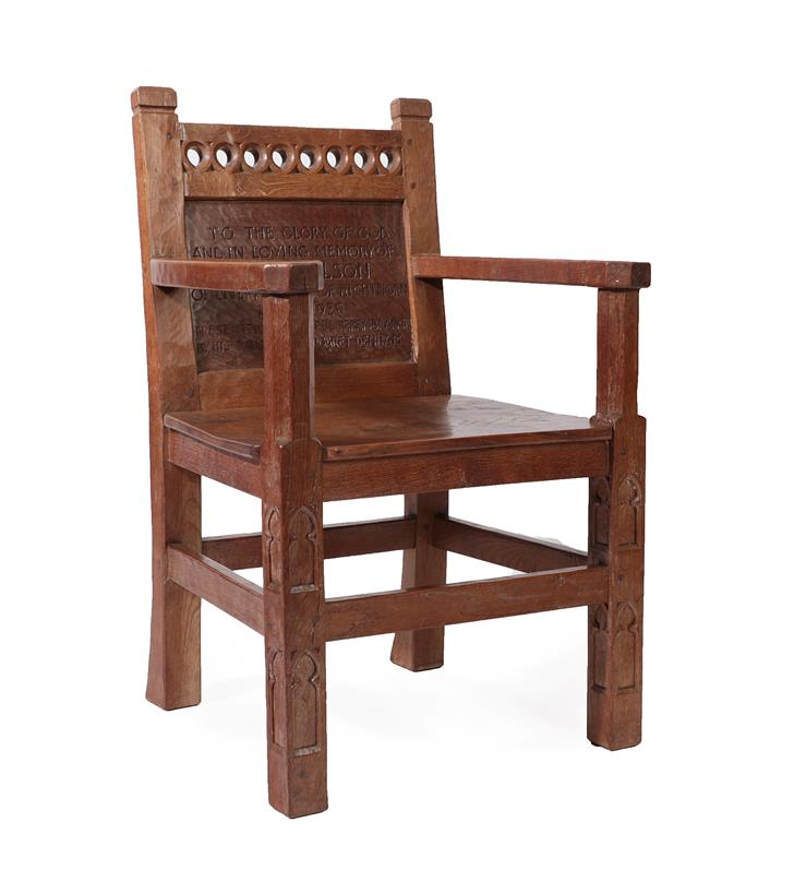Lot 2089 - Robert Mouseman Thompson (1876-1955): An English Oak Arm Chair, with tracery top rail, above a...