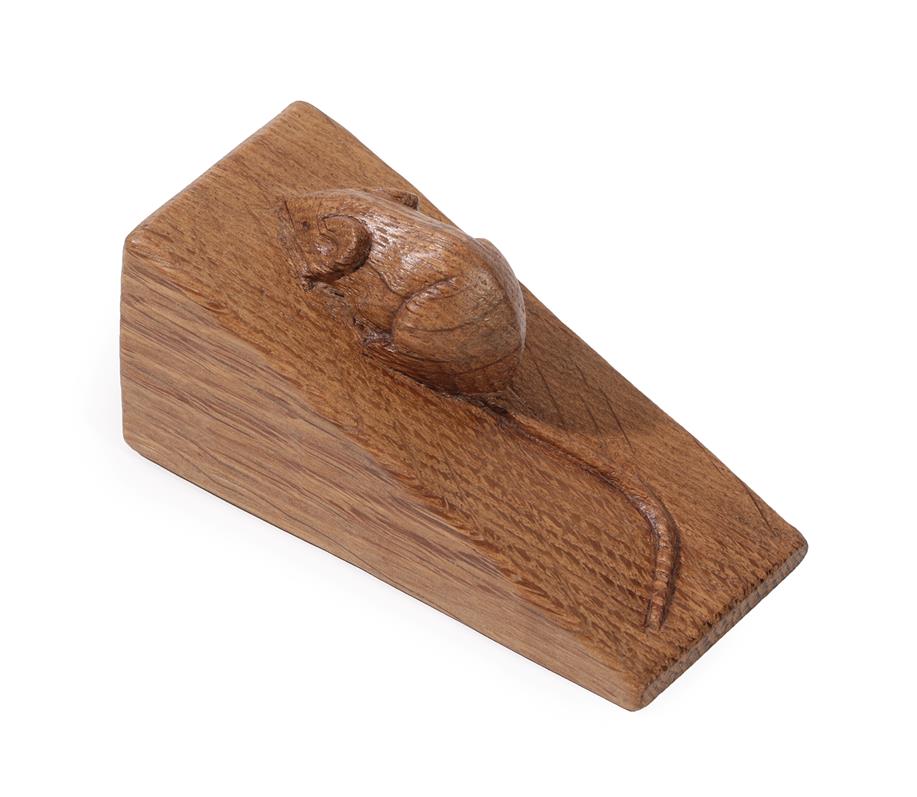 Lot 2102 - Workshop of Robert Mouseman Thompson (Kilburn): An English Oak Wedge, with carved mouse...