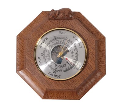 Lot 2108 - Workshop of Robert Mouseman Thompson (Kilburn): An English Oak Barometer, the octagonal frame...