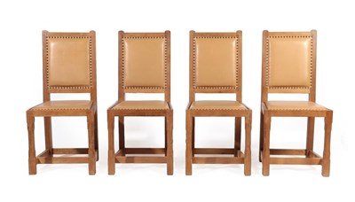 Lot 2202 - Rabbitman: A Set of Four Peter Heap (Wetwang) English Oak Dining Chairs, upholstered seats and...