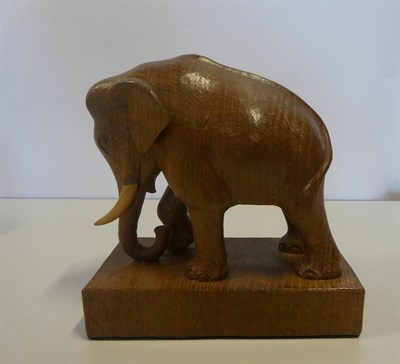 Lot 2205 - Woodpeckerman: Stan Dodds (1928-2012): An English Oak Elephant Carving, with right front leg...