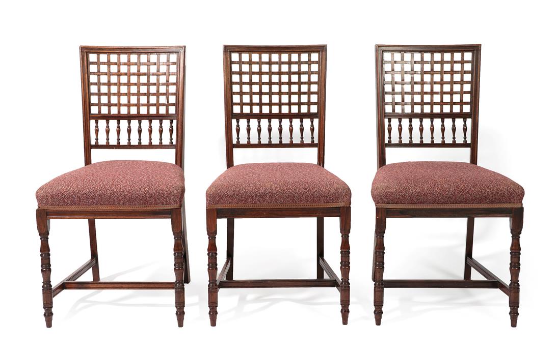 Lot 2212 - Three Aesthetic Movement Rosewood Chairs, with lattice panels and turned spindle backs, upholstered