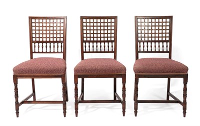 Lot 2212 - Three Aesthetic Movement Rosewood Chairs, with lattice panels and turned spindle backs, upholstered