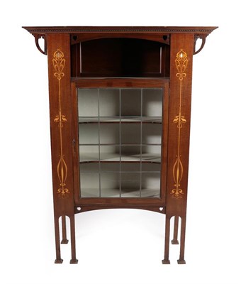 Lot 2217 - An Art Nouveau Leaded Glazed and Marquetry Inlaid Mahogany Display Cabinet, with an overhanging...