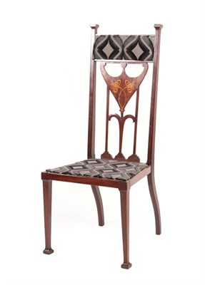 Lot 2223 - An Art Nouveau Inlaid Mahogany Chair, upholstered top rail between two capped supports, inlaid...