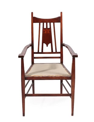 Lot 2224 - An Art Nouveau Stained Beech Armchair, with shaped top rail above a slatted and inlaid splat,...